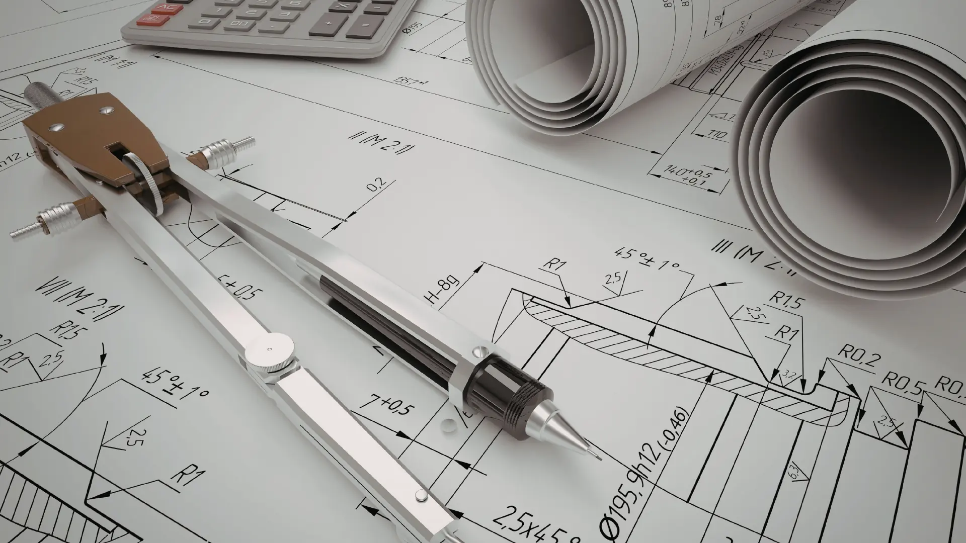 Herramientas de precisión y planos técnicos de ingeniería